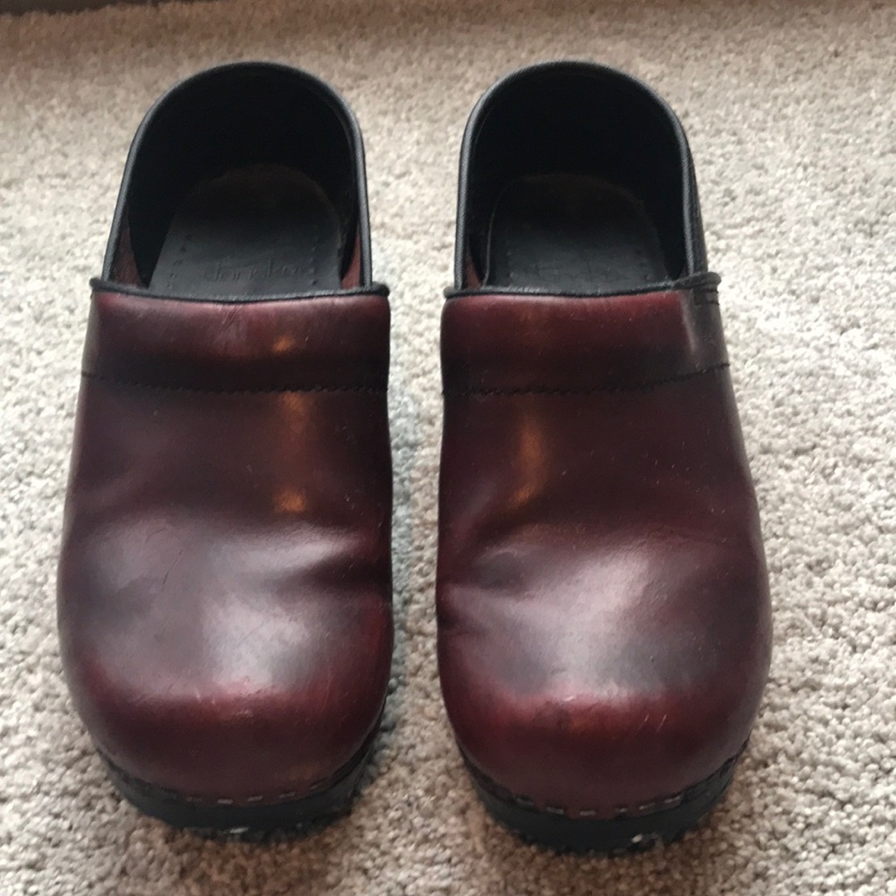 Dansko clogs, cranberry color.